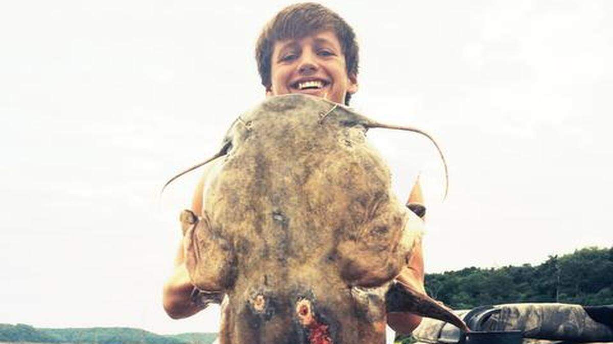 
Drake Adams, 16, of Harrisonville, displayed the 53-pound flathead catfish he, his dad and a family friend caught on a trotline at Truman Lake.
