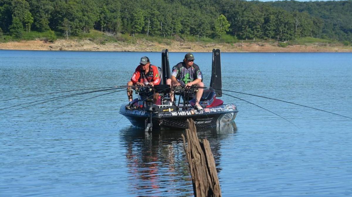 
Charlie Bunting (left) and his son, Travis, had plenty of baits in the water when they went spider rigging for crappies at Truman Lake. Trolling with a series of long rods, they caught and released almost 50 fish.
