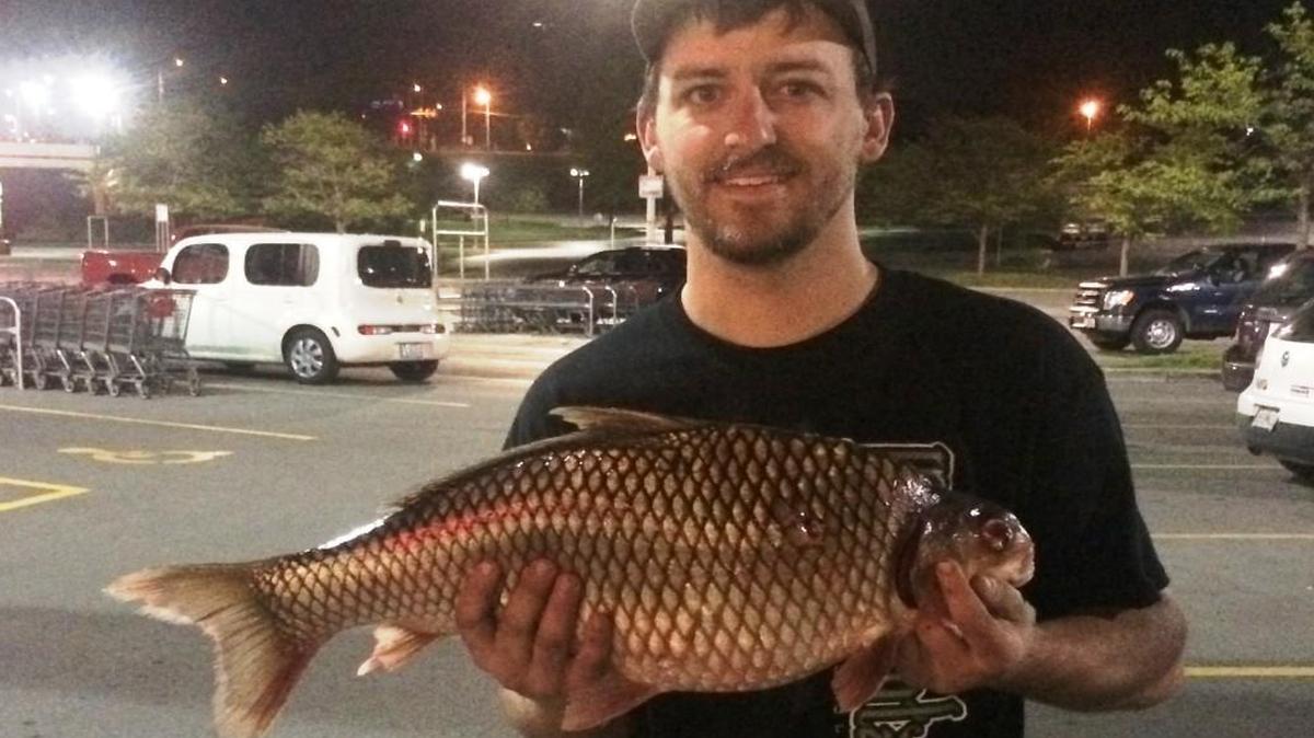 Jonathon Randall of Conception Junction Mo., all was smiles after learning that the big river carpsucker he shot with his bow at Smithville Lake qualified as a world record.