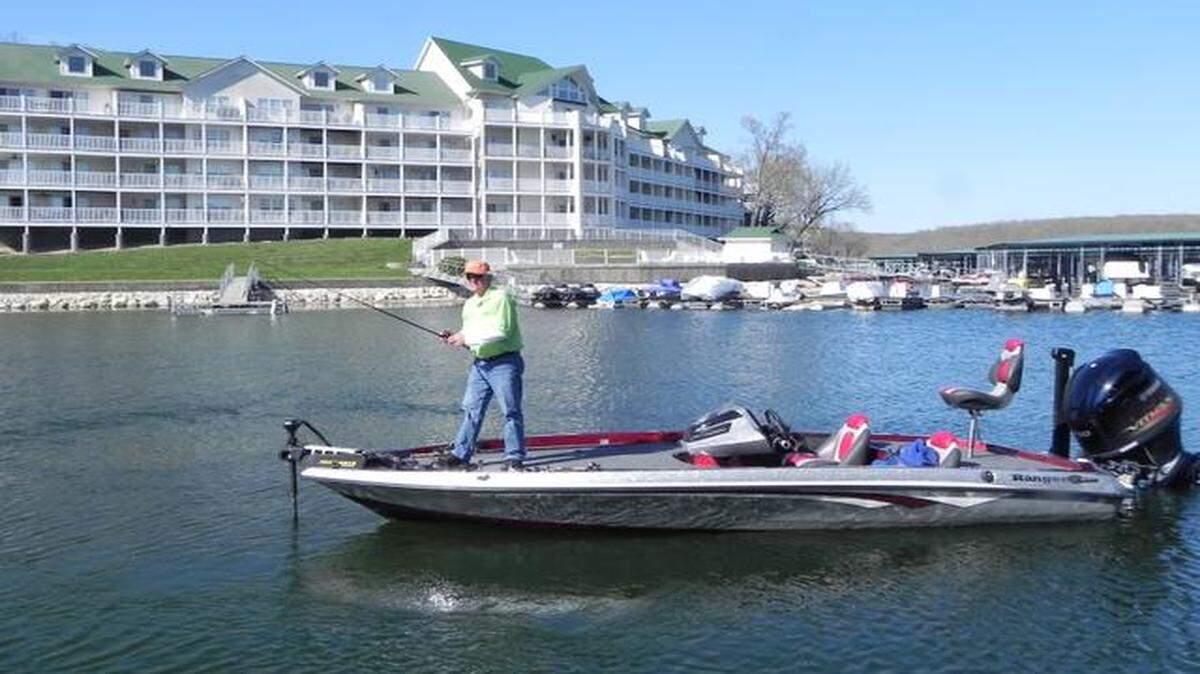 
Bob Bueltmann, better known as Bassing Bob, fished in a cove behind his condo unit at Lake of the Ozarks, trying to catch a big bass. Through his website, he issues daily fishing reports on what is taking place at the big lake.
