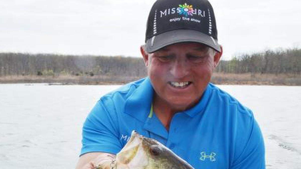 
Scott Pauley, a marketing representative for the Missouri Division of Tourism, admired a bass he caught Thursday at Stockton Lake.
