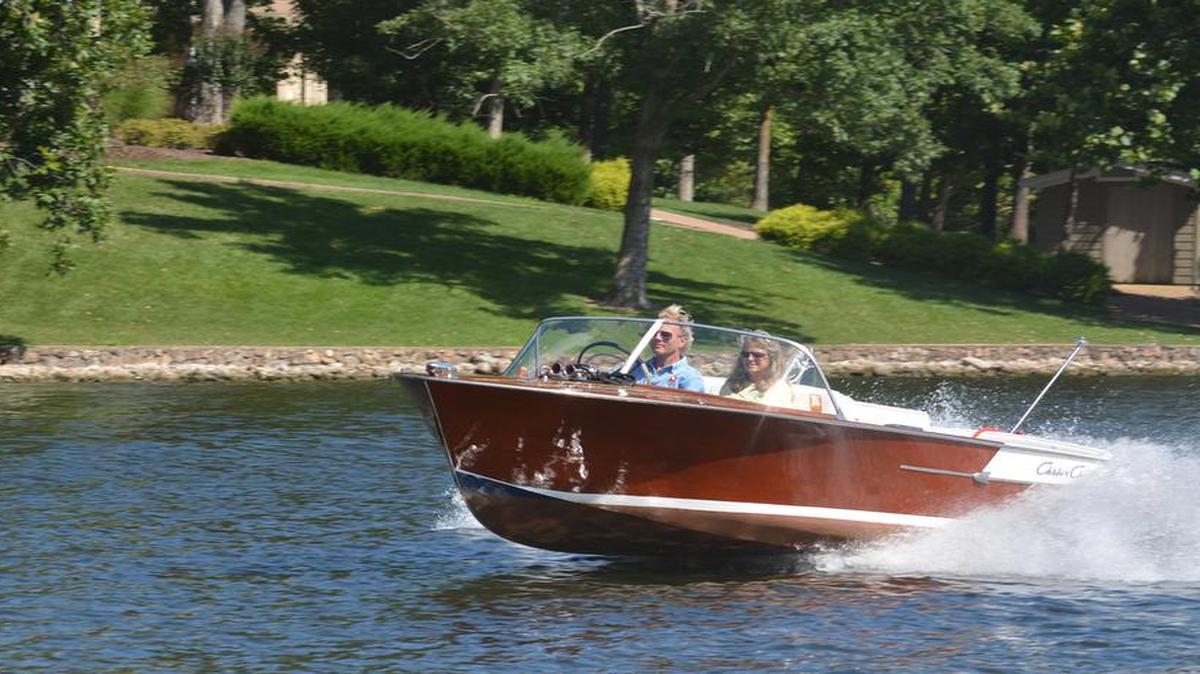 
Terry and Sue Hart took their 1961 Chris-Craft ski boat out for a run on Lake of the Ozarks on a recent weekday. Terry collects and restores vintage wooden boats.
