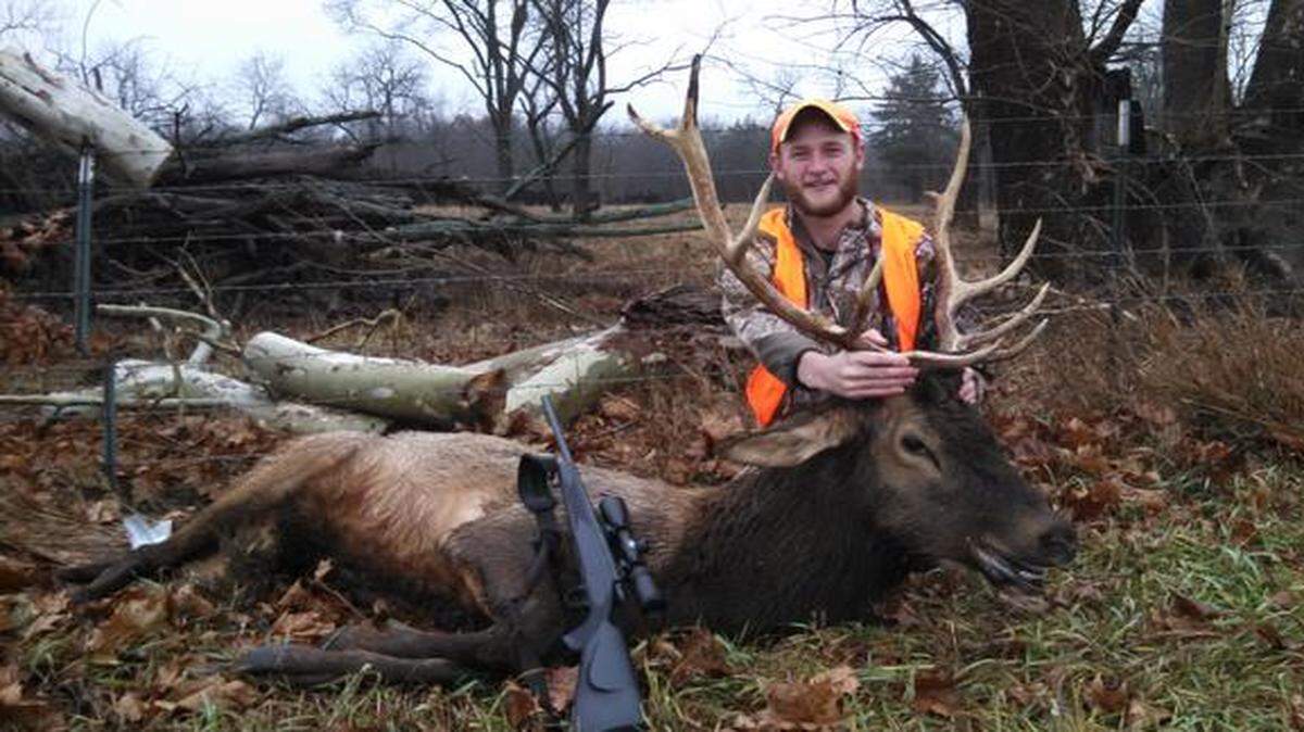 
Brogun Jahn of Garnett, Kan., posed with the elk he shot in Anderson County in December.
