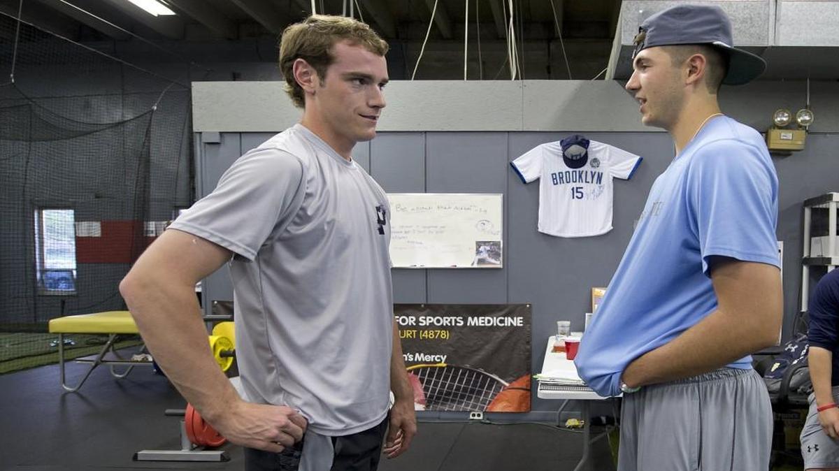 Joey Wentz (left) who was a pitcher for Shawnee Mission East and Riley Pint, who was at St. Thomas Aquinas, talked with each other last year before they were drafted.