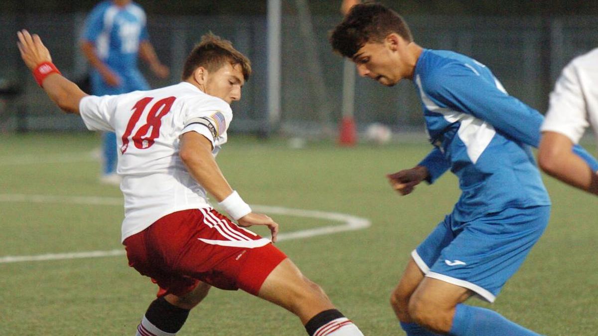 
Park Hill’s Christian Fullmer attempted to steal the ball from Liberty’s Dane Larason during their match last week at Park Hill South High School.
