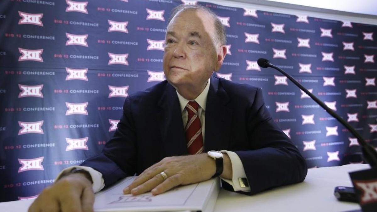 University of Oklahoma President David Boren listens to a question at the Big 12 sports conference meetings in Irving, Texas on Thursday.