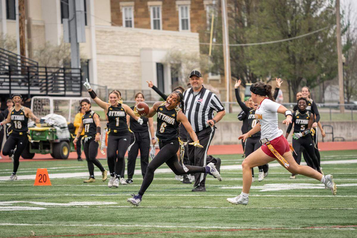 Ottawa defensive back Jukanie Washington (#6) is the KCAC Defensive Player of the Year as a senior. The spirited captain always shows her personality, sticking her tongue out as she returns an interception for a touchdown.