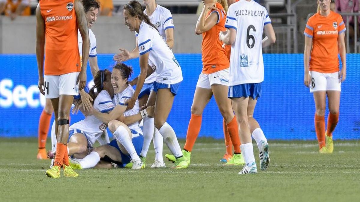 
FCKC players celebrate one of their two goals against the Houston Dash on Saturday at BBVA Compass Stadium in Houston.
