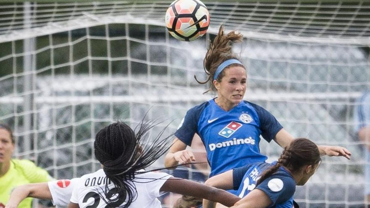 FC Kansas City’s Shea Groom heads the ball away from the goal during a match at Swope Soccer Village.