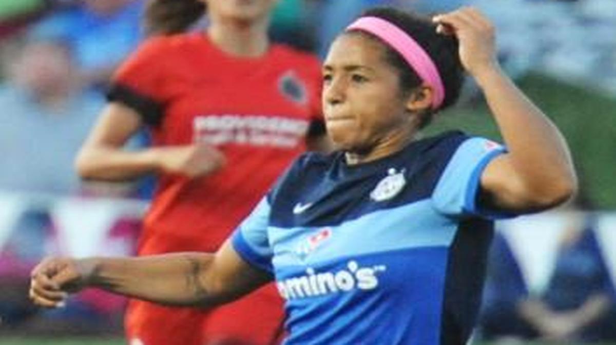 FC Kansas City midfielder Desiree Scott (center) during a game against Portland Thorns FC last April at Swope Soccer Village.