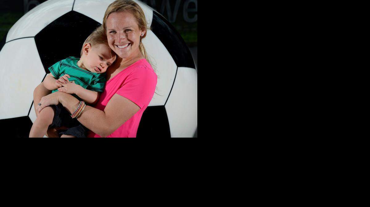 FC Kansas City’s Amy Rodriguez knows she has a fan for life in her son Ryan, who is 10 months old. The feeling is mutual.