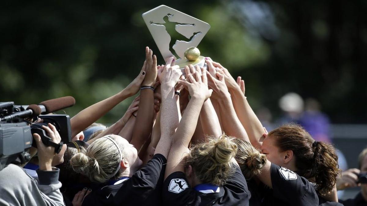 FC Kansas City players lifted their first championship trophy in 2014.