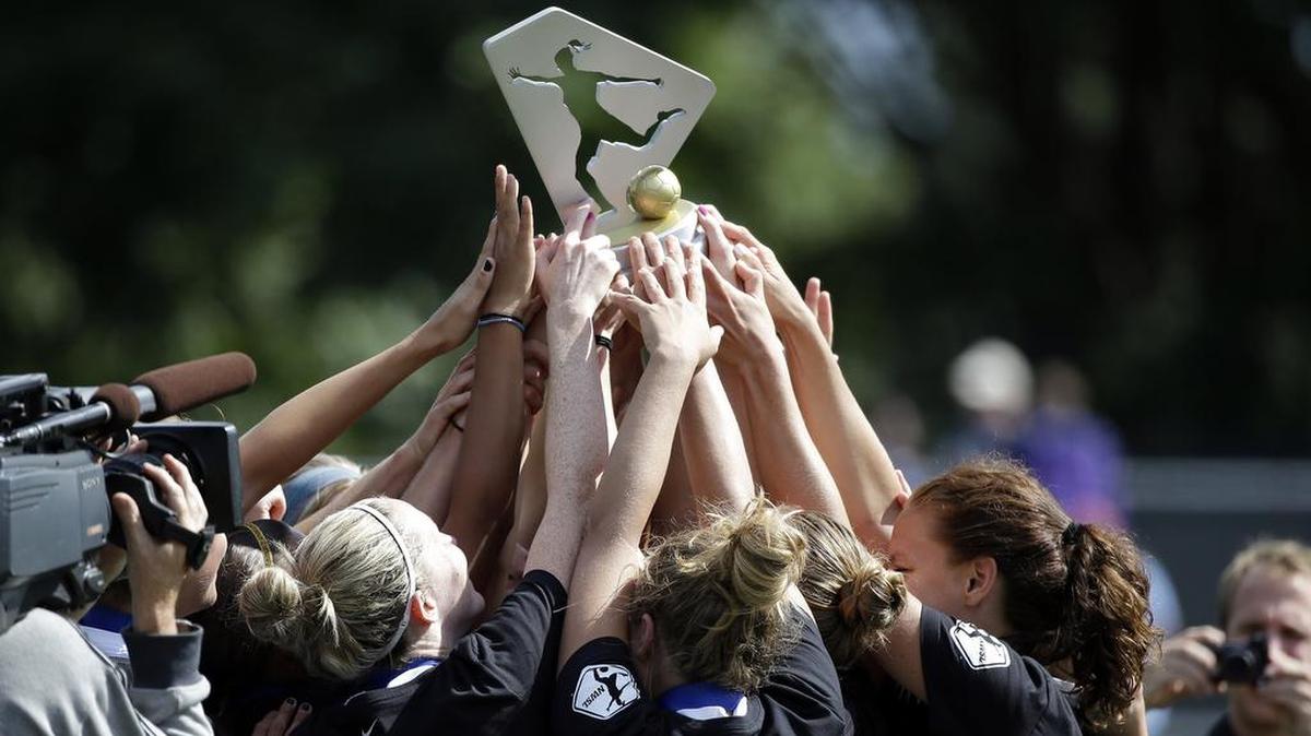 FC Kansas City players have celebrated two league championships, including this one in 2014, but the franchise is expected either to fold or move to Salt Lake City, according to a source.