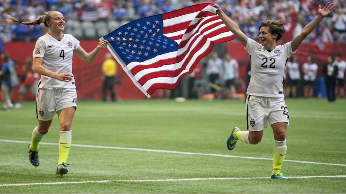 Becky Sauerbrunn (left) and Meghan Klingenberg celebrated after the United State women’s national soccer team won last year’s World Cup championship in Vancouver, British Columbia.