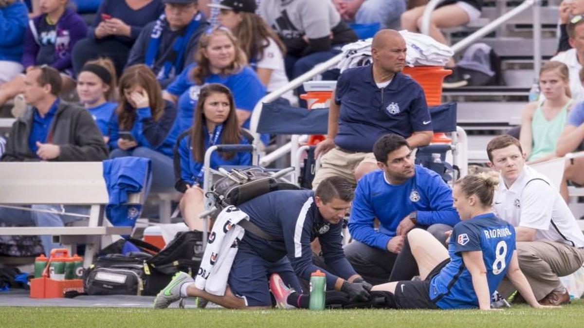 An air-cast was applied to the leg of FC Kansas City Amy Rodriguez as she sat on the sideline in the second half of the FC Kansas City and Boston Breakers NWSL soccer game at Swope Soccer Village on Sunday. FC Kansas City beat the Boston Breakers 2-0.