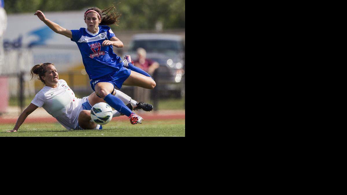 
Jackie Santacaterina (18) of the Chicago Red Stars and Erika Tymrak (15) of FC Kansas City compete for the ball on Sunday, August 18, 2013, at the Verizon Wireless Field in Overland Park, Kansas. FC Kansas City was defeated by the Chicago Red Stars 2-1 
