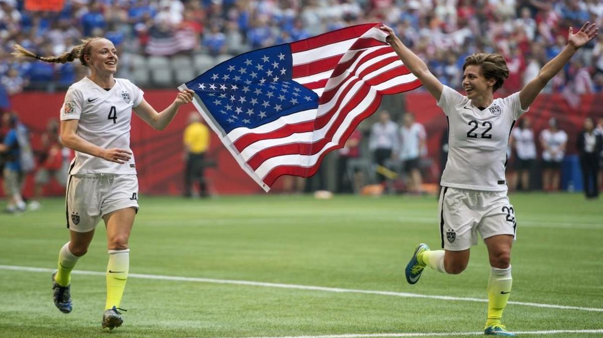 Becky Sauerbrunn (left) celebrated with teammate Meghan Klingenberg after helping the United Stateds win the Women's World Cup soccer championship.