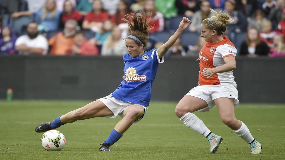 
FC Kansas City forward and Liberty High School graduate Shea Groom (left) must take on a greater role Saturday with the absence of four U.S. Women’s National Team members.
