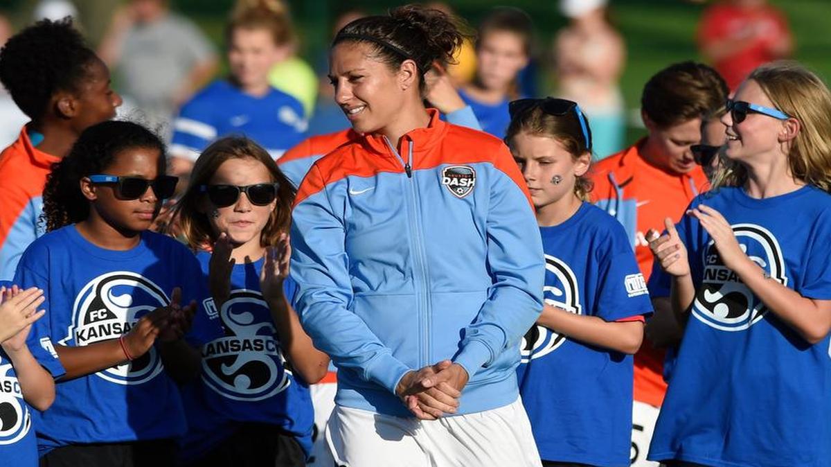 
Carli Lloyd (middle) got a huge ovation while being honored before Monday’s game in Kansas City.
