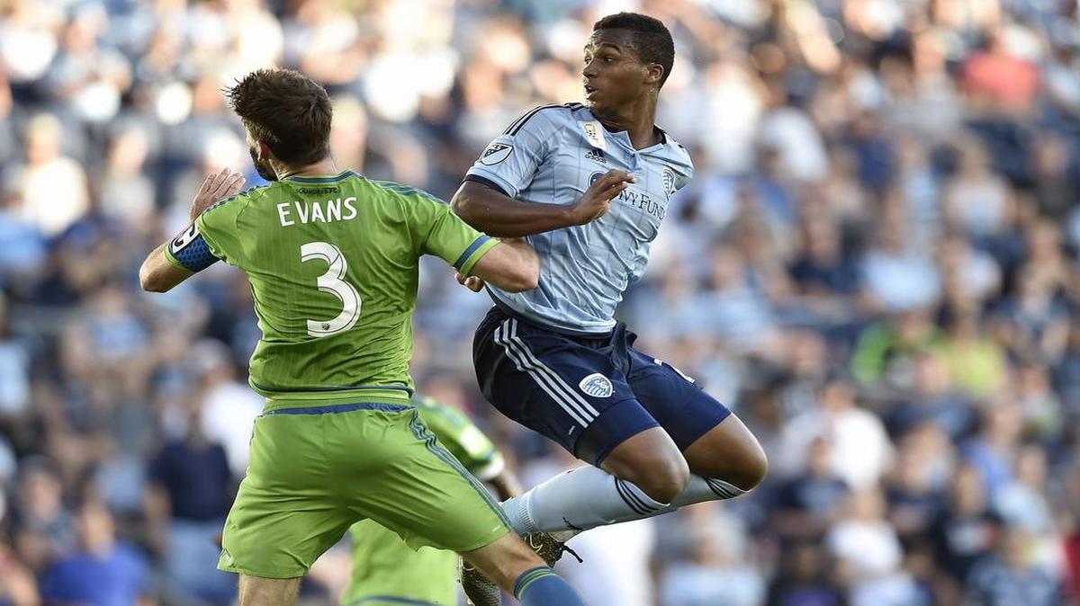 Seattle's Brad Evans (3) and Sporting KC's Erik Palmer-Brown (right) looked back to see if Palmer-Brown's header went into the goal as Sporting Kansas City hosted the Seattle Sounders FC at Sporting Park Sunday, Sept. 27, 2015.