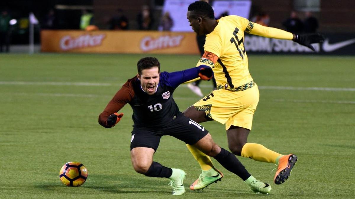 United States’ Benny Feilhaber (left) defends Jamaica’s Je-Vaughn Watson during first half of Friday’s friendly in Chattanooga, Tenn.