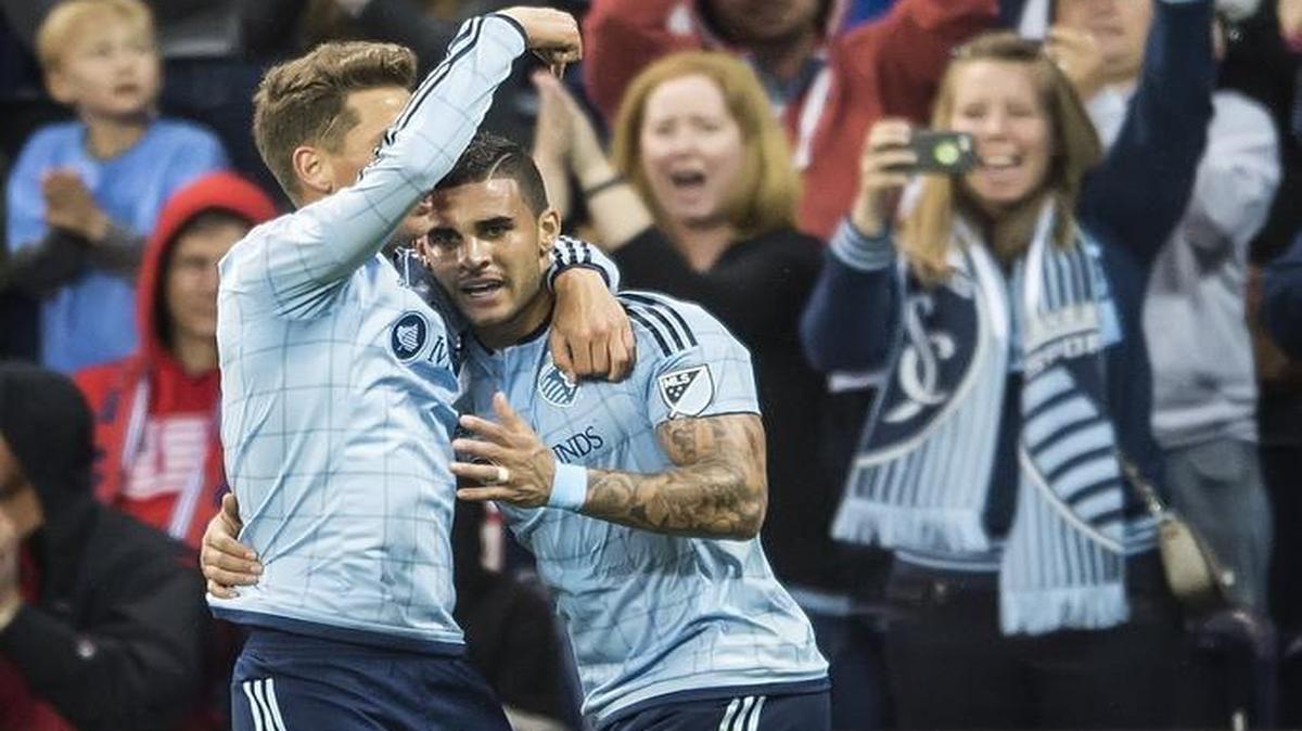 
Sporting KC’s Krisztian Nemeth (left) celebrated after his pass to forward Dom Dwyer (right) led to the team’s first goal of the night Wednesday at Sporting Park. 

