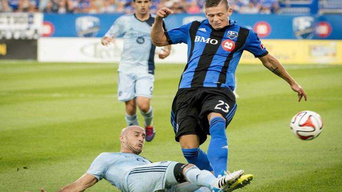 
Sporting Kansas City’s Aurelien Collin knocked the ball from the Impact’s Krzysztof Krol during a game in Montreal earlier this month. Sporting won the game 2-1 as part of a four-game road winning streak.
