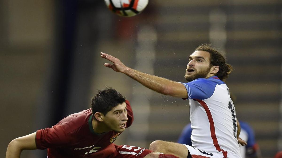 Sporting KC’s Graham Zusi (right) played with the U.S. national team when it faced Bolivia several years ago at Children’s Mercy Park.