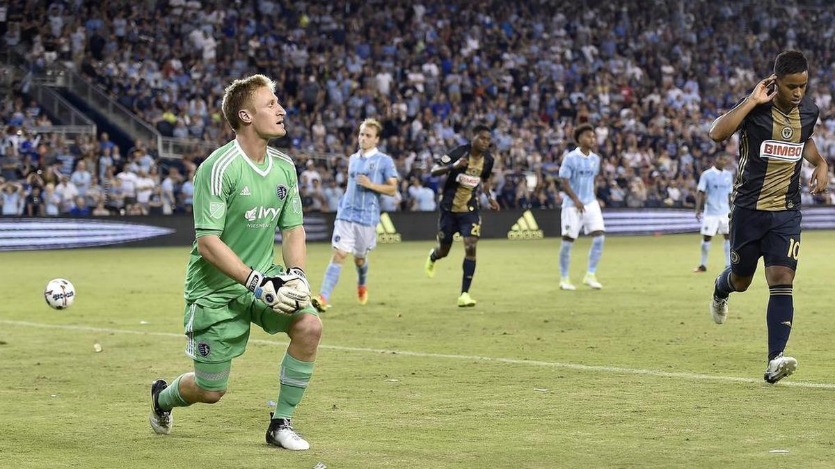 Sporting Kansas City goalkeeper Tim Melia (left), shown after giving up a penalty kick to Philadelphia earlier this season, won’t play in Thursday’s playoff game at Houston.