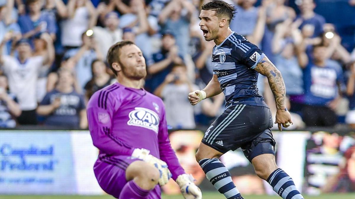 
Sporting Kansas City forward Dominic Dwyer (14) celebrates his third goal in the first half near FC Dallas goalkeeper Chris Seitz (18) on Wednesday, July 1, 2015, during the Lamar Hunt U.S. Open Cup soccer match at Sporting Park in Kansas City, Kan.
