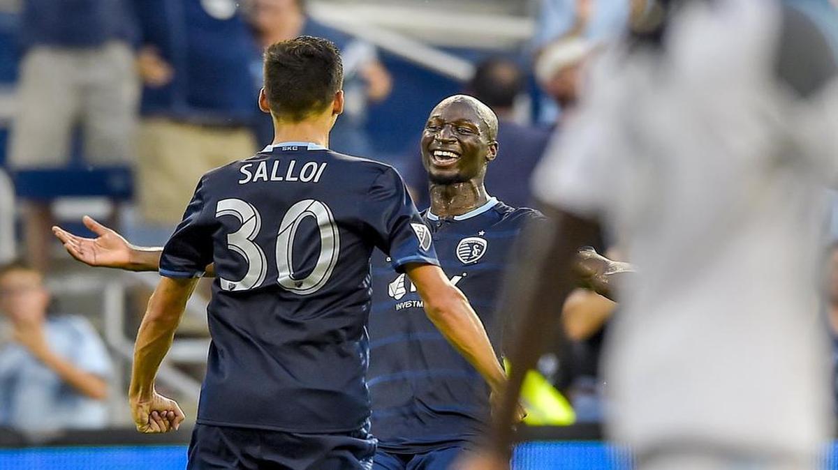 Sporting Kansas City’s Ike Opara (3) celebrated his goal with teammate Daniel Salloi (30) during the first half of the MLS soccer match against the Minnesota United on Wednesday at Children's Mercy Park in Kansas City, Kan.