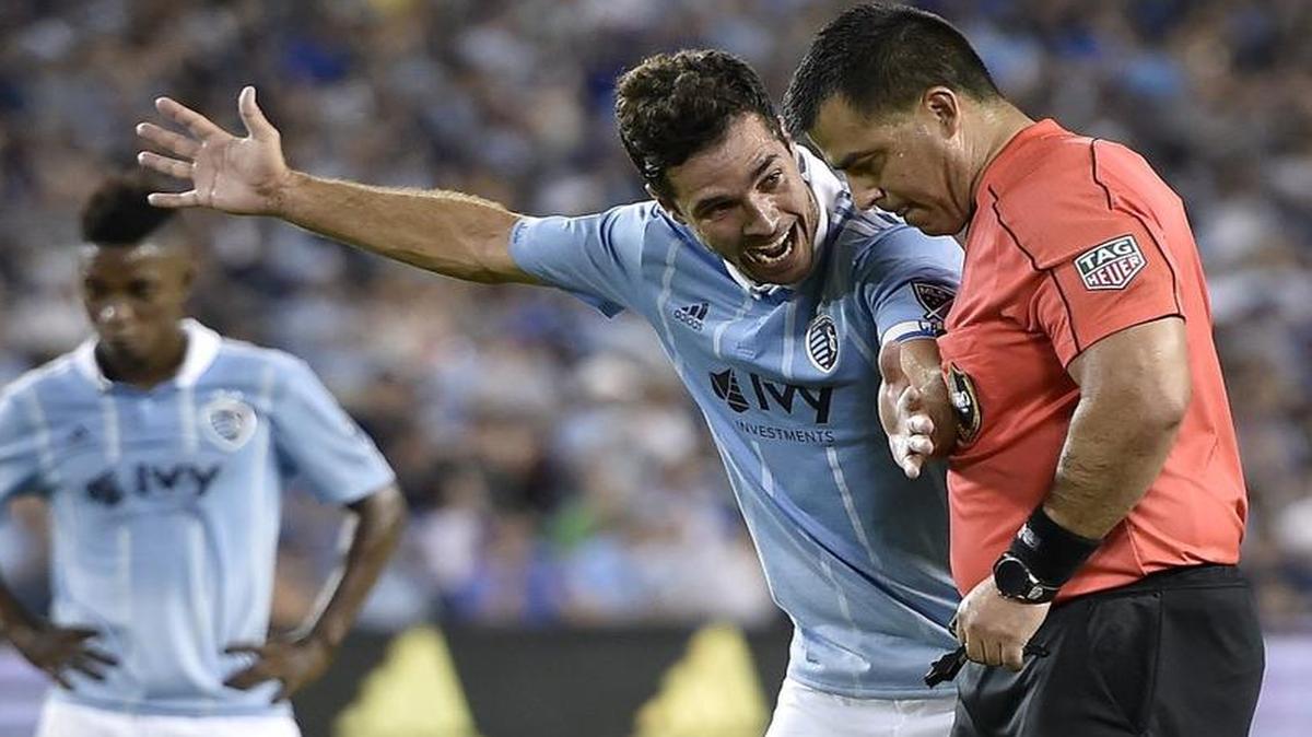 Sporting KC's Benny Feilhaber (left) argued with referee Ricardo Salazar during a game last month. Replay, soon to be implemented by MLS, could allay complaints over some calls.