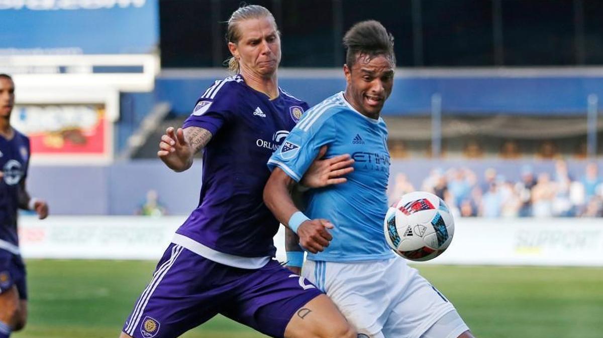 New York City FC forward Khiry Shelton (right) was defended by Orlando City FC midfielder Brek Shea during a game last year.