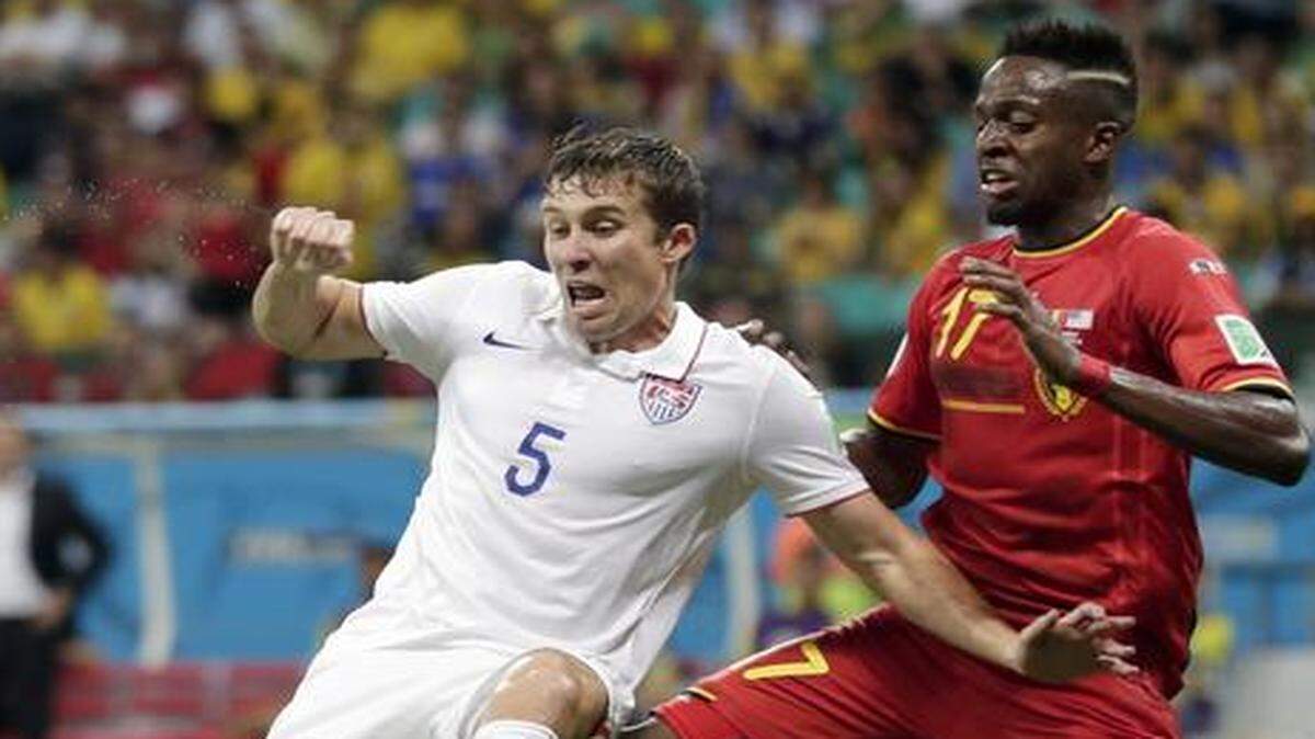 
Matt Besler (left) played for the U.S. men’s national team against Divock Origi and Belgium in the 2014 World Cup in Brazil.


