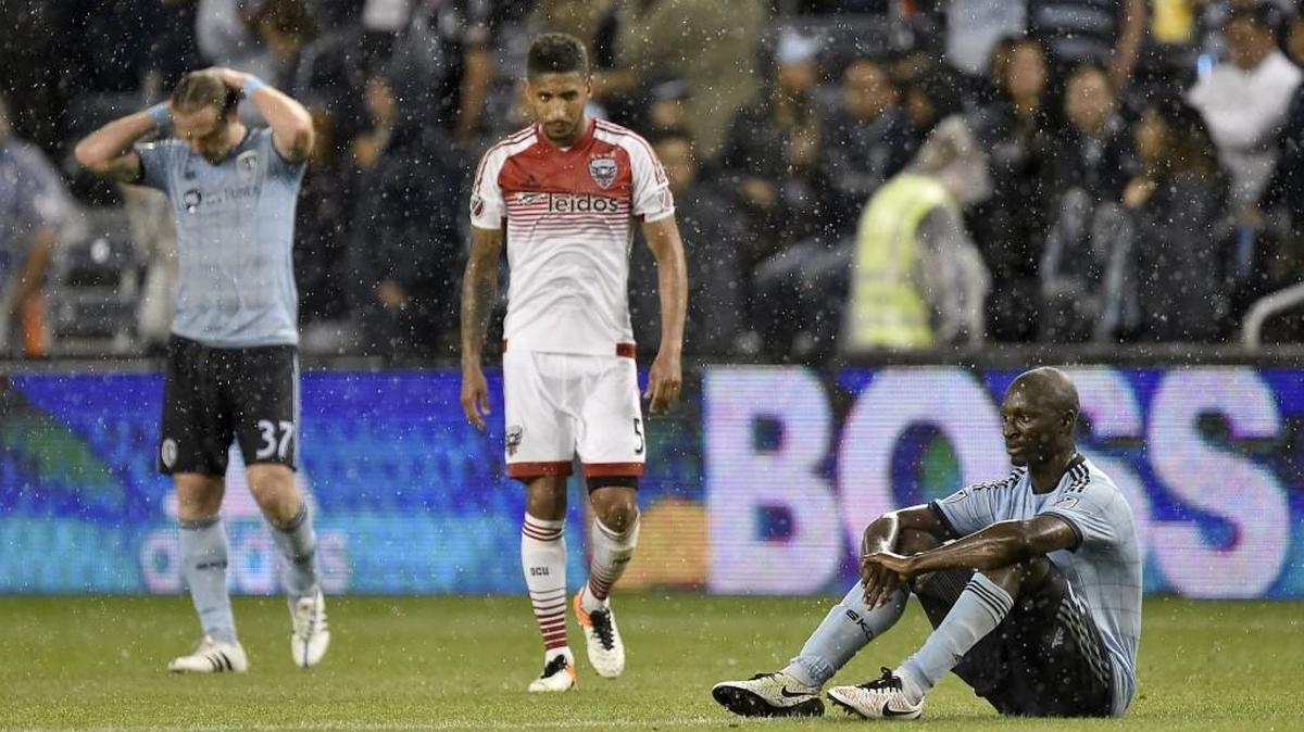 Sporting KC players Jacob Peterson (left) and Ike Opara were beside themselves after Sean Franklin (center) and D.C. United handed the team a 1-0 loss Friday at Children’s Mercy Park.