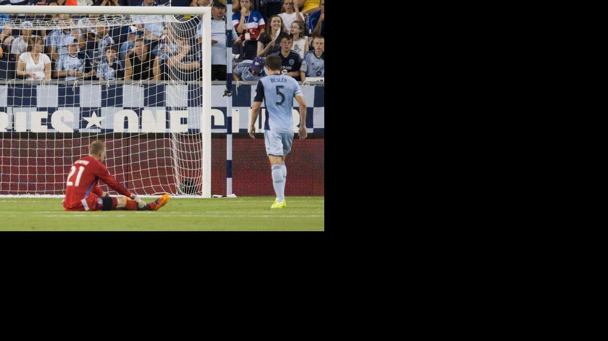 
Sporting Kansas City’s Jon Kempin reflected on giving up a goal against D.C. United as Matt Besler walked to retrieve the ball from the back of the net in a game on Aug. 23.
