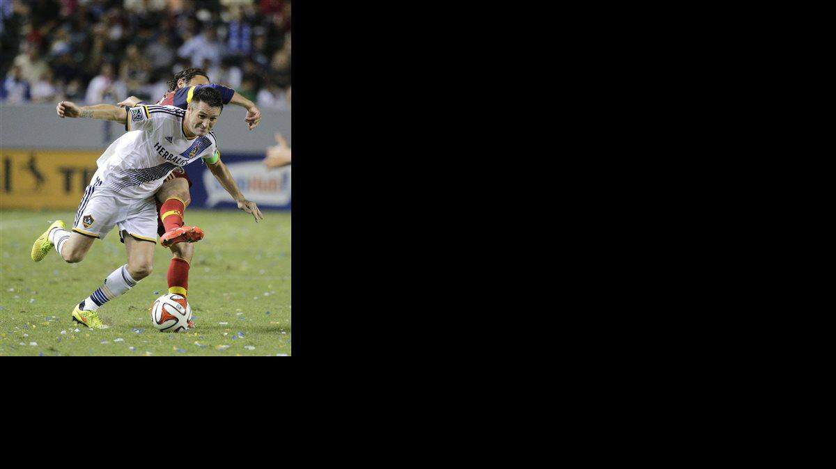 
The Los Angeles Galaxy and Robbie Keane, (foreground) prevailed last Saturday 1-0 over Real Salt Lake and Ned Grabavoy in Carson, Calif. 
