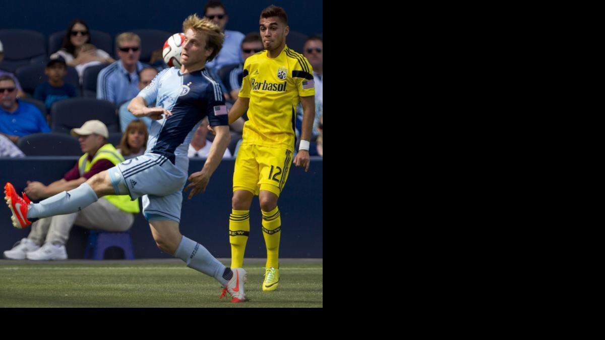 
Sporting KC defender Seth Sinovic (left) went to Rockhurst High and grew up a Royals fan.


