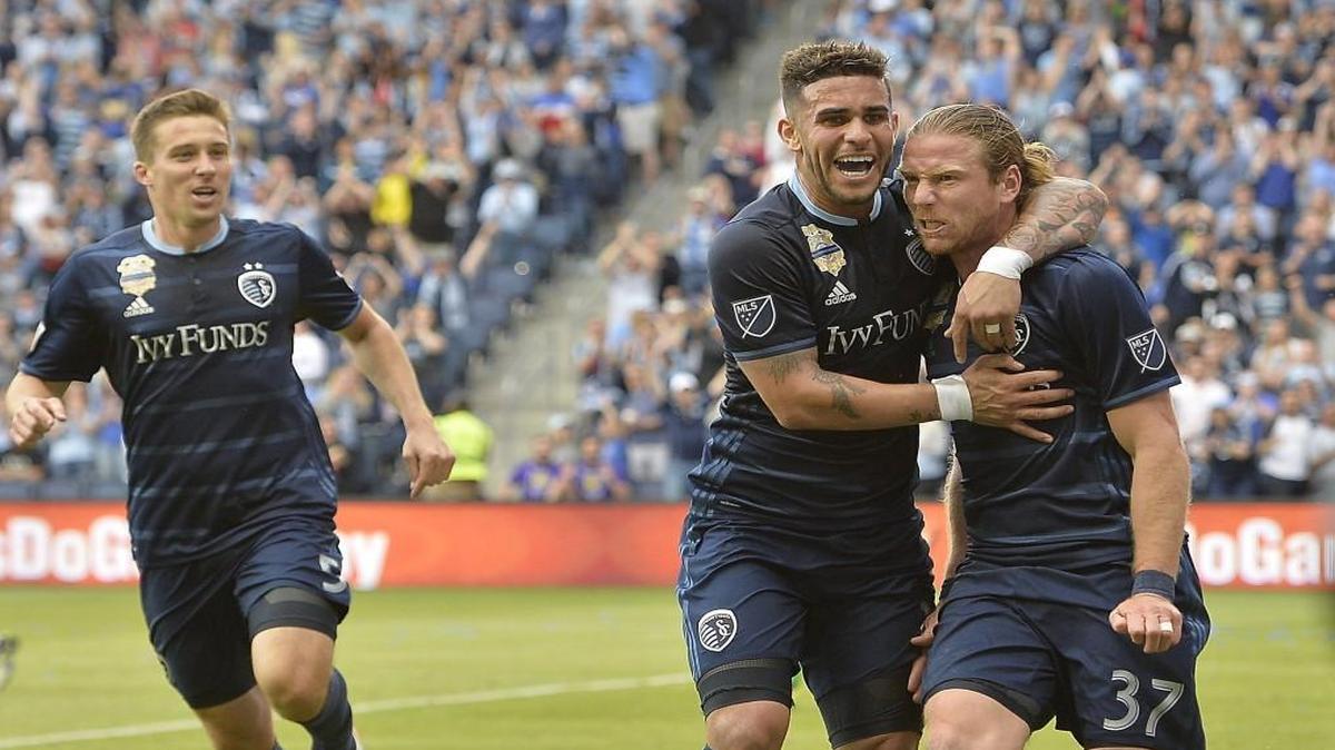 Jacob Peterson, right, deserved hugs for his performance Sunday against Orlando City SC.