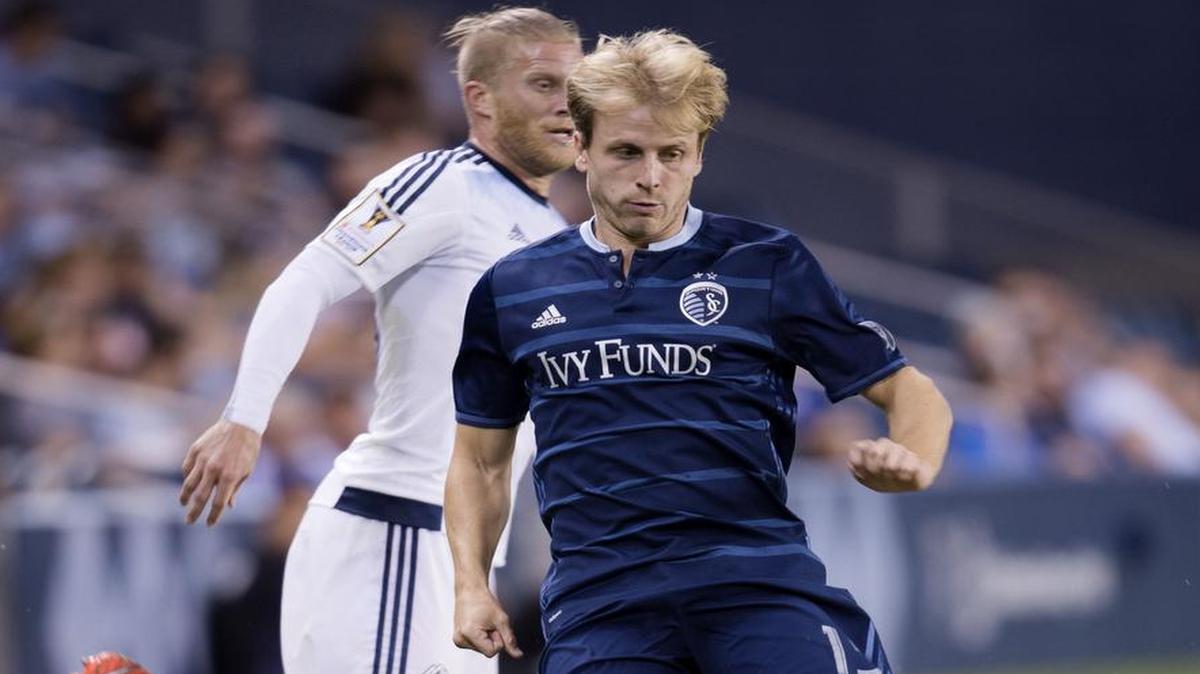 Sporting Kansas City defender Seth Sinovic (front) stole the ball away from Vancouver Whitecaps defender Marcel de Jong during the first half of the Champions League soccer match Tuesday, September 13, 2016, at Children's Mercy Park.