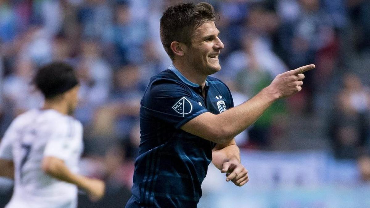 Sporting Kansas City forward Diego Rubio celebrated after scoring a goal against Vancouver Whitecaps FC in the first half of Wednesday’s match in Vancouver, British Columbia. The teams eventually played to a 1-1 draw.