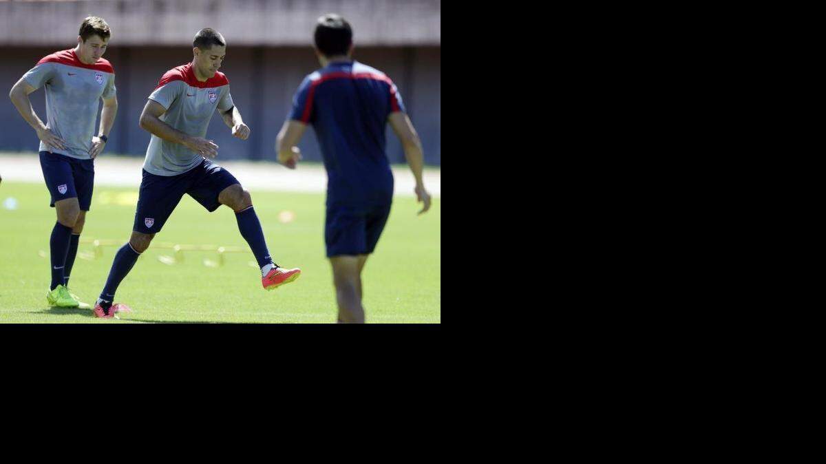 
Clint Dempsey (center) and Sporting KC’s Matt Besler (left) worked out with the rest of the U.S. team Monday in preparation for Tuesday’s game against Belgium. 
