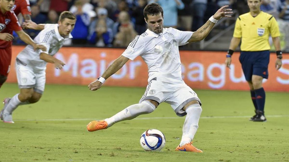 Sporting KC midfielder Benny Feilhaber (right)