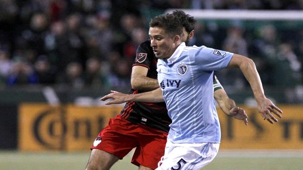 Sporting Kansas City’s Matt Besler (right) says his team has done a good job so far this season of not giving the ball up in bad spots.