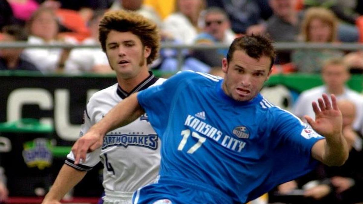 
The Wizards' Chris Klein (17) just gets his foot on the ball to beat San Jose defender Wade Barrett (rear) for the first goal of their April 12, 2002, game at Arrowhead Stadium. The Wizards won the game 2-0.
