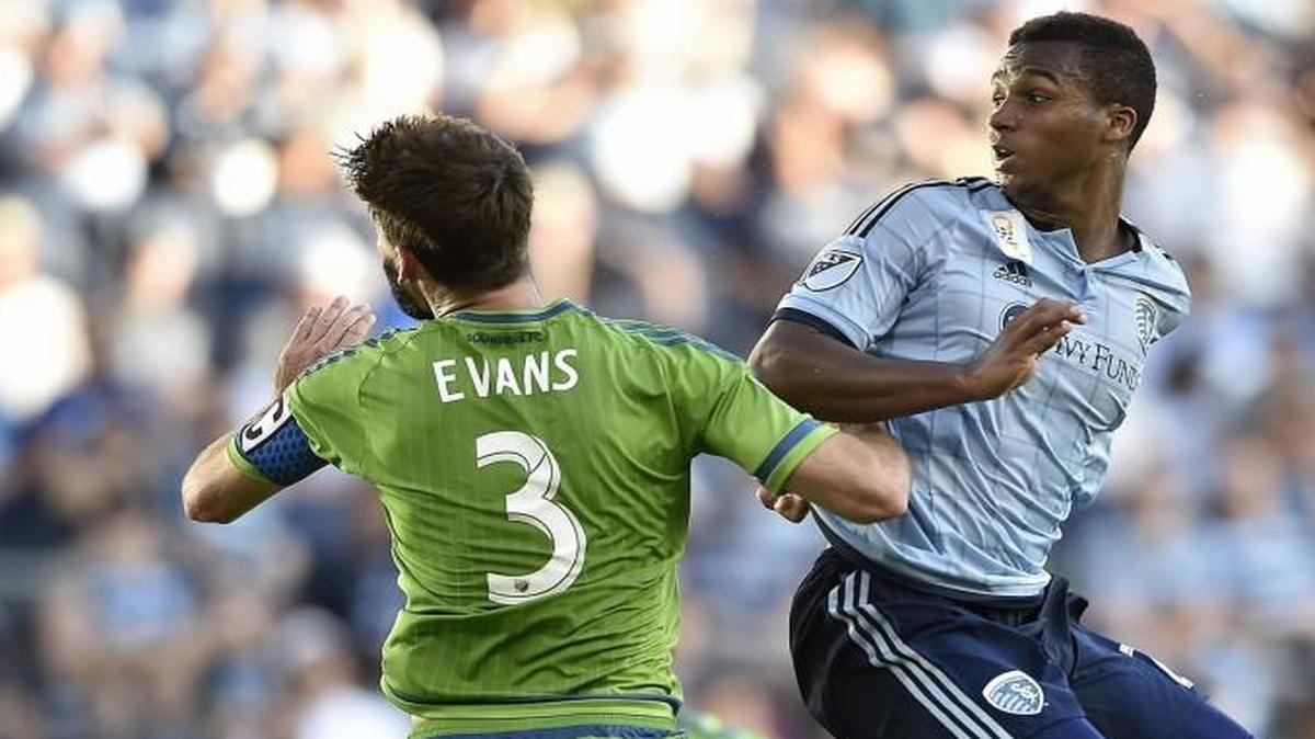 During a game last year with Sporting Kansas City, Erik Palmer-Brown headed a shot on goal over Seattle’s Brad Evans.