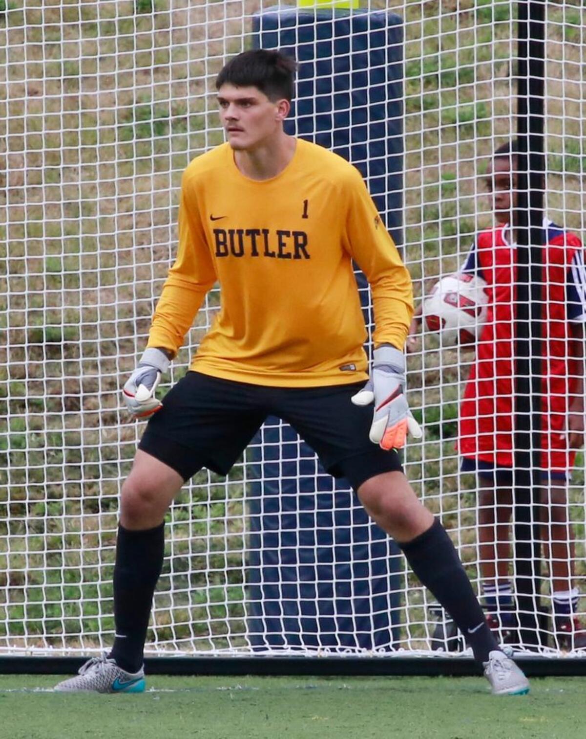 Eric Dick is an imposing presence in goal, standing 6 foot 5.