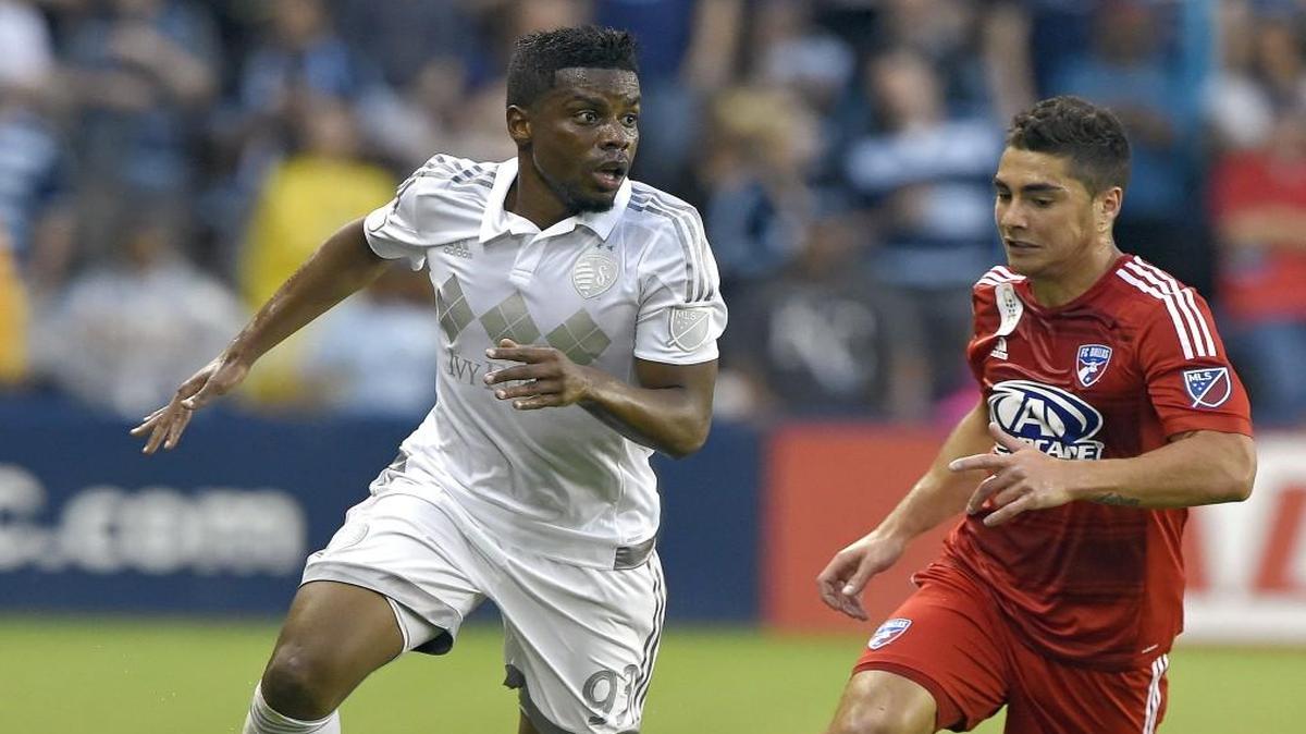 Sporting KC midfielder Soni Mustivar (left).