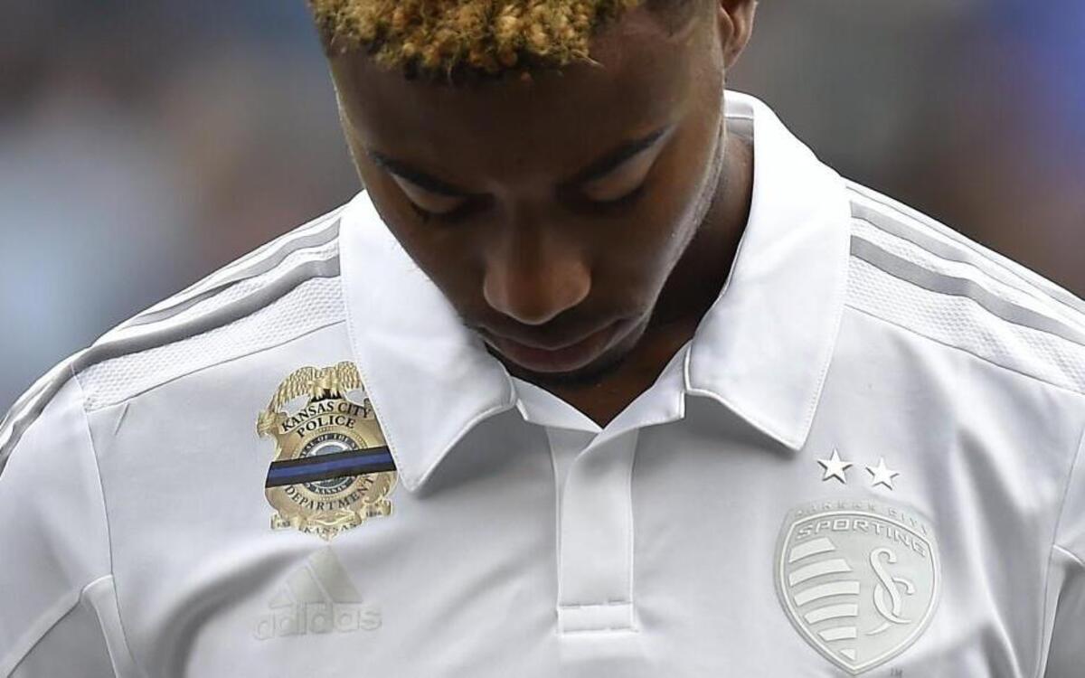 A day after Children’s Mercy Park hosted the funeral service for Kansas City, Kan., police Capt. Robert David Melton, who was shot and killed Tuesday in the line of duty, a moment of silence honored him before Sporting KC played the Seattle Sounders FC. Sporting players, including Saad Abdul-Salaam, also wore jerseys with the image of a KCK police badge with a black-and-blue band on it.
