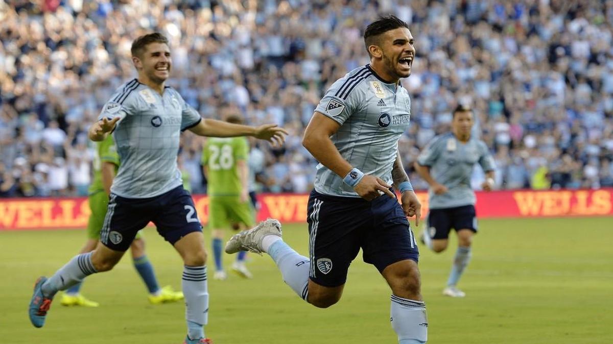 Sporting KC's Connor Hallisey (left) and Dom Dwyer react after Dwyer's second half goal to tie the Seattle Sounders on Sept. 27 at Sporting Park.